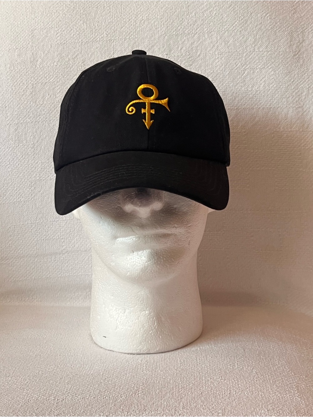Black Cap with Gold Prince Symbol Embroidery